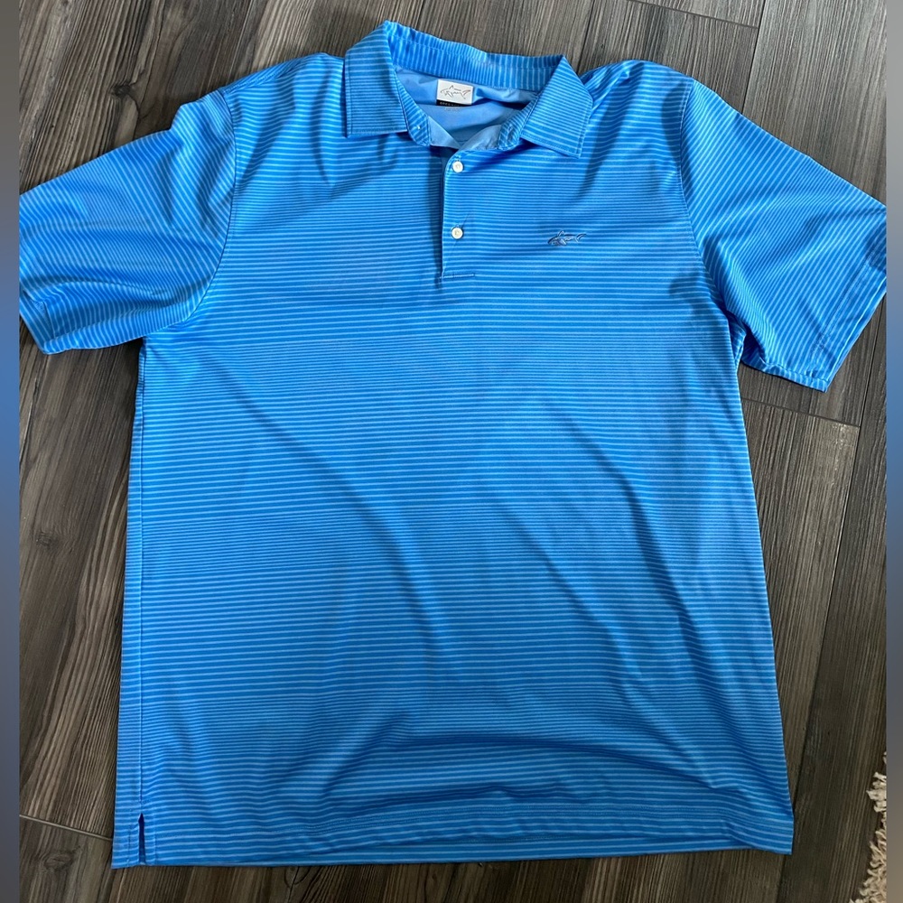 Men’s Greg Norman Polo, size XL, color blue stripes, good condition